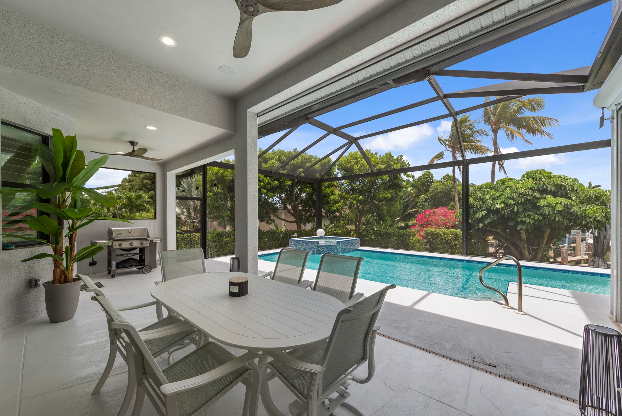 1066 Ruppert Rd Marco Island — covered lanai, pool, and spa