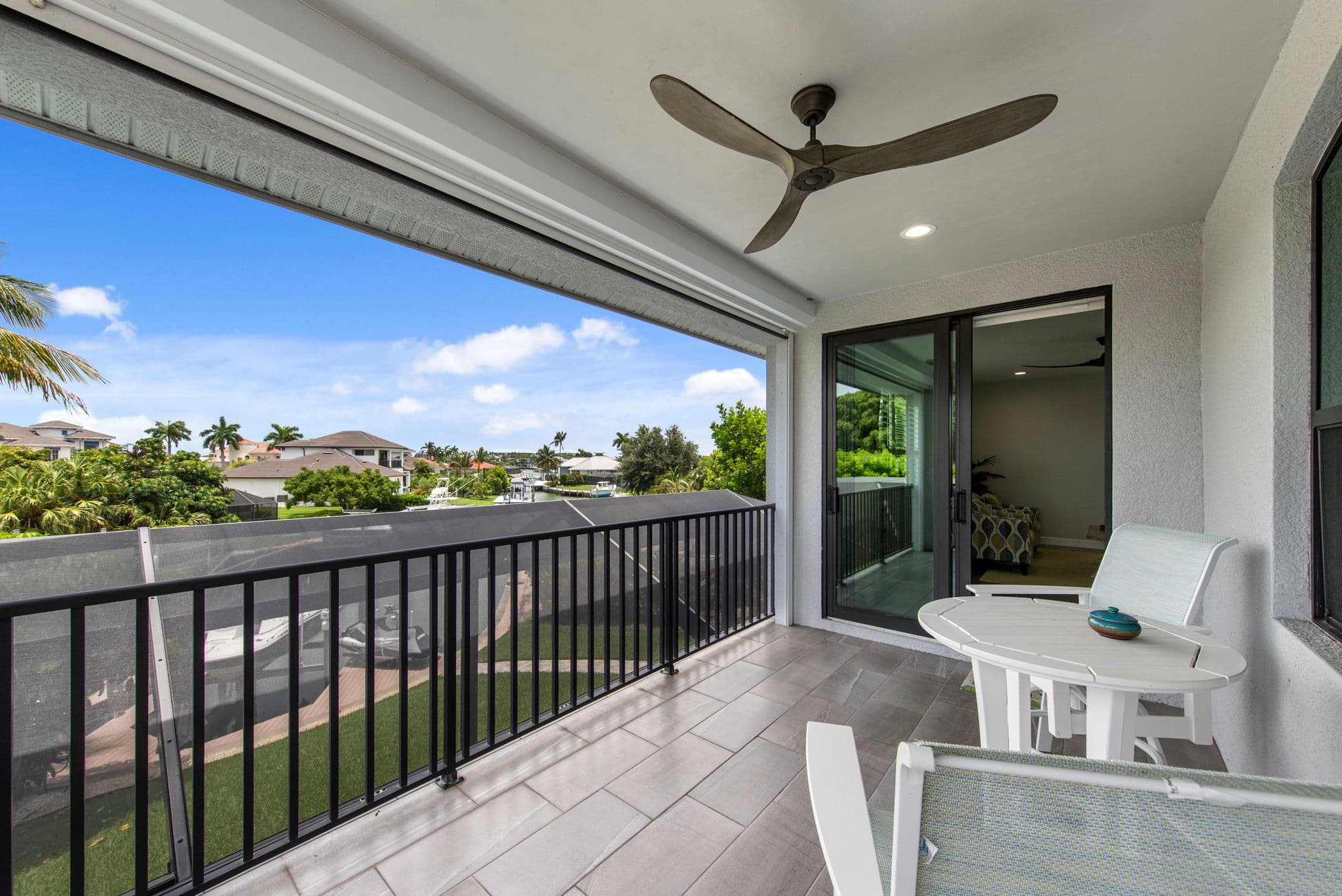 1066 Ruppert Rd Marco Island — screened balcony with water view