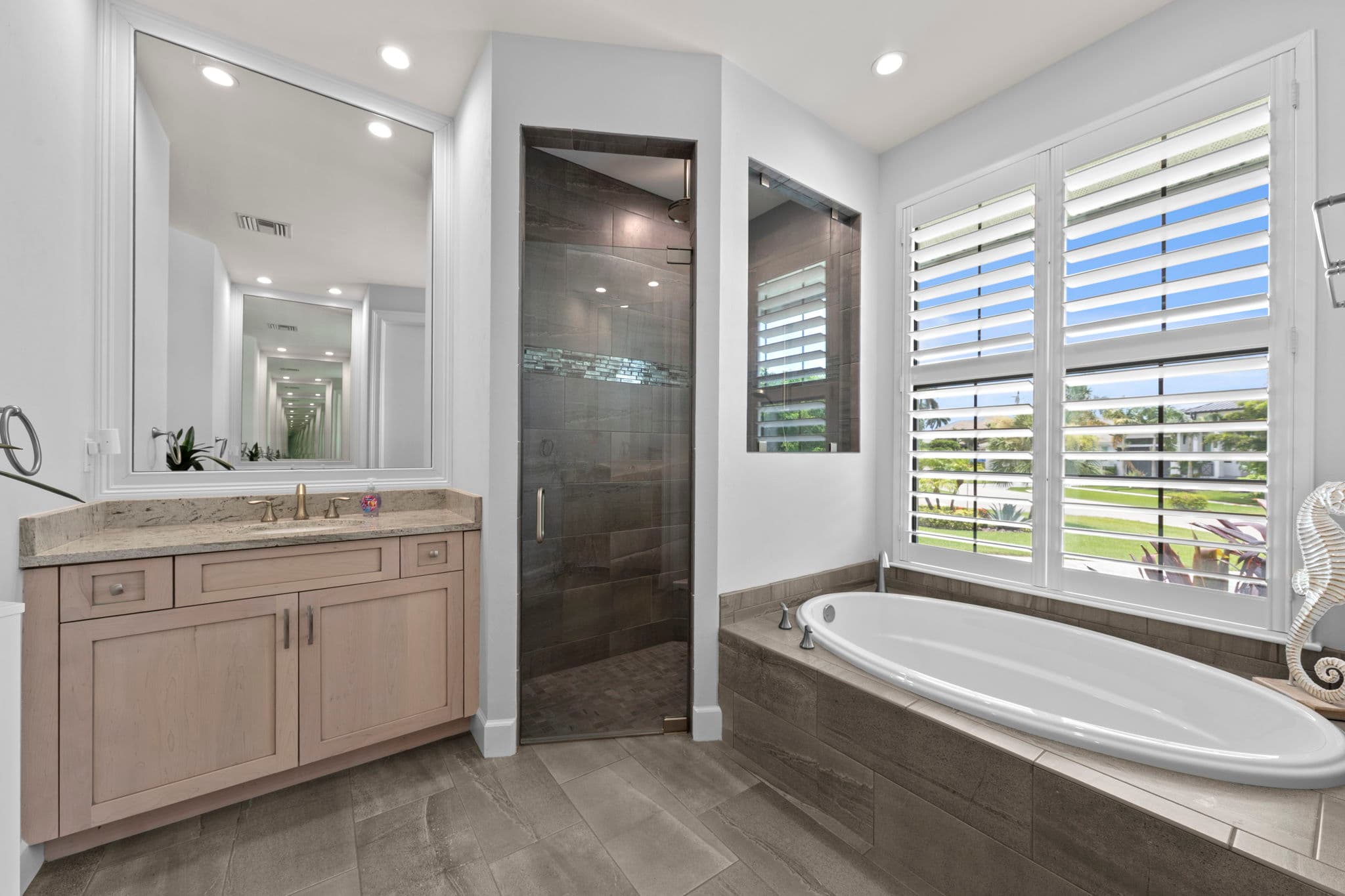 1066 Ruppert Rd Marco Island — bathroom with soaking tub and shower