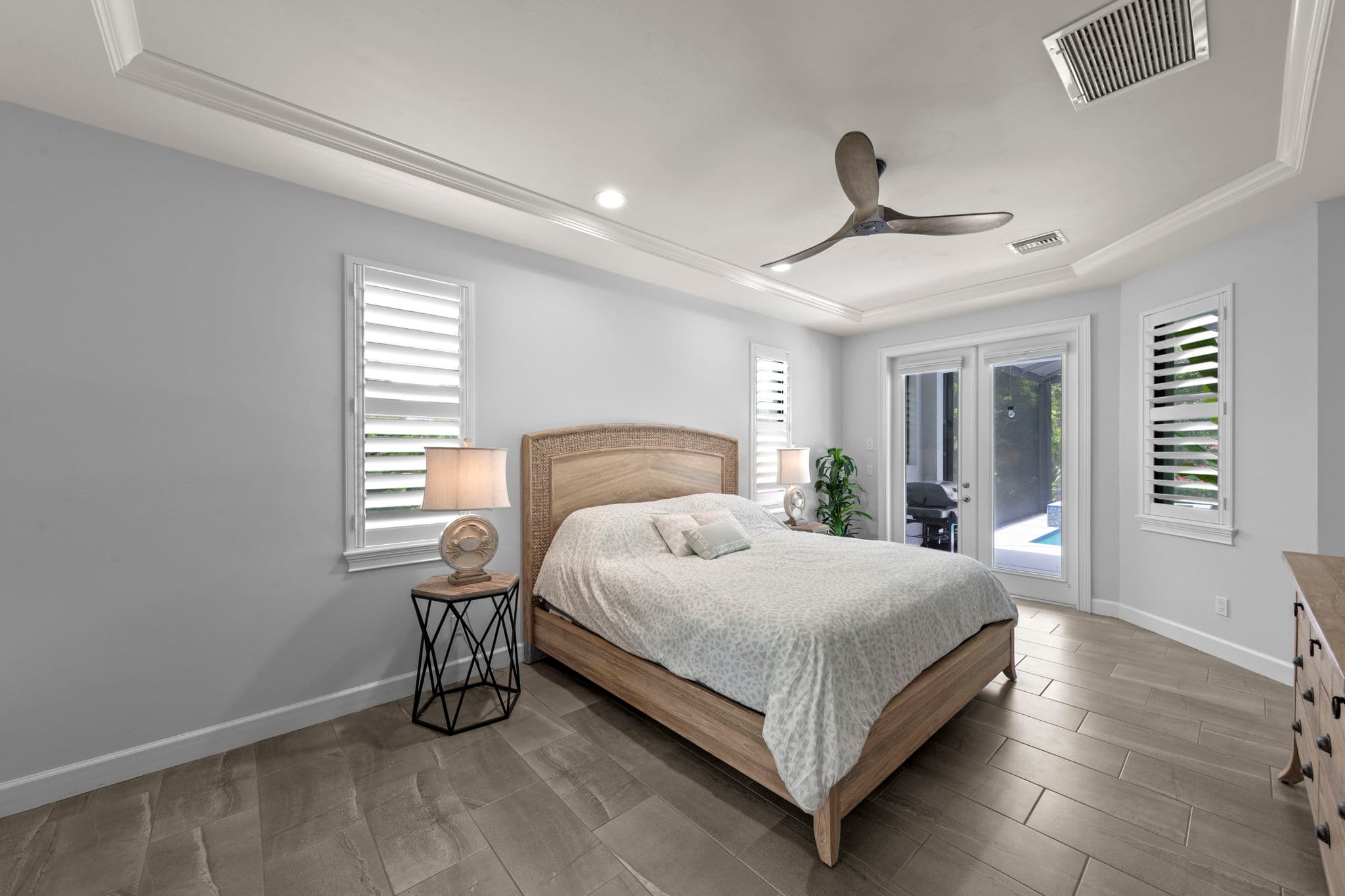 1066 Ruppert Rd Marco Island — primary bedroom with pool access